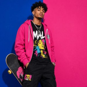photos-people-editorial-portraits · Confident High Fashion Portrait Of Skateboarder Mal Against